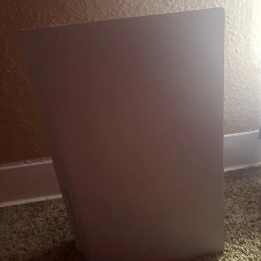 Sony White and Black Gaming Console